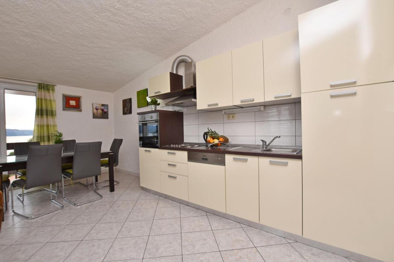 Apartments Mladen Duće Buitenkant foto